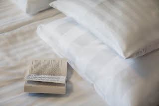 Copyright: Rebecca Watson
rebeccawatsonphotography@gmail.com
Book on bed